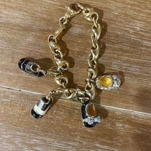 Nordstrom Gold Tone Bracelet with Black and Crystal Charms